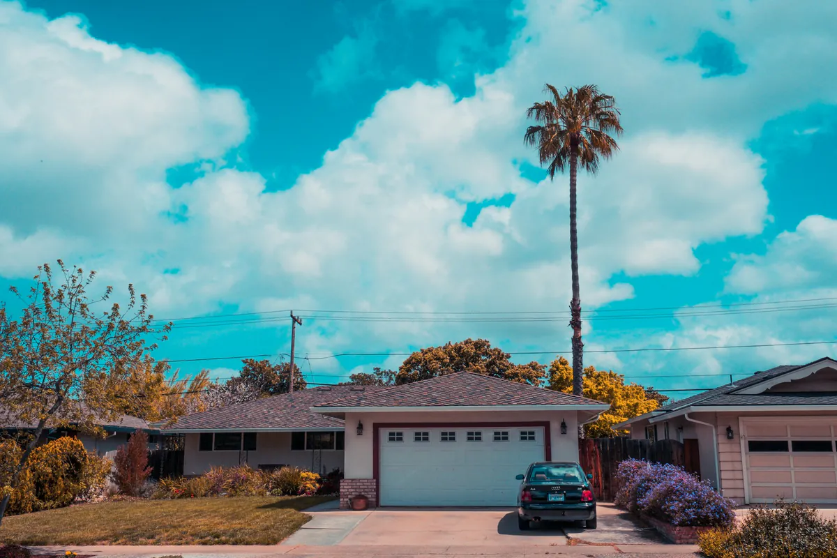 Single story California home with a two car garage on a quiet residential street